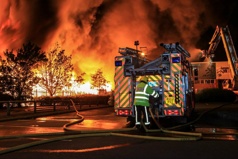 Illustration for article titled Stunning Photos: Raging Fire Fed by 55,000 Tons of Plastic and Paper